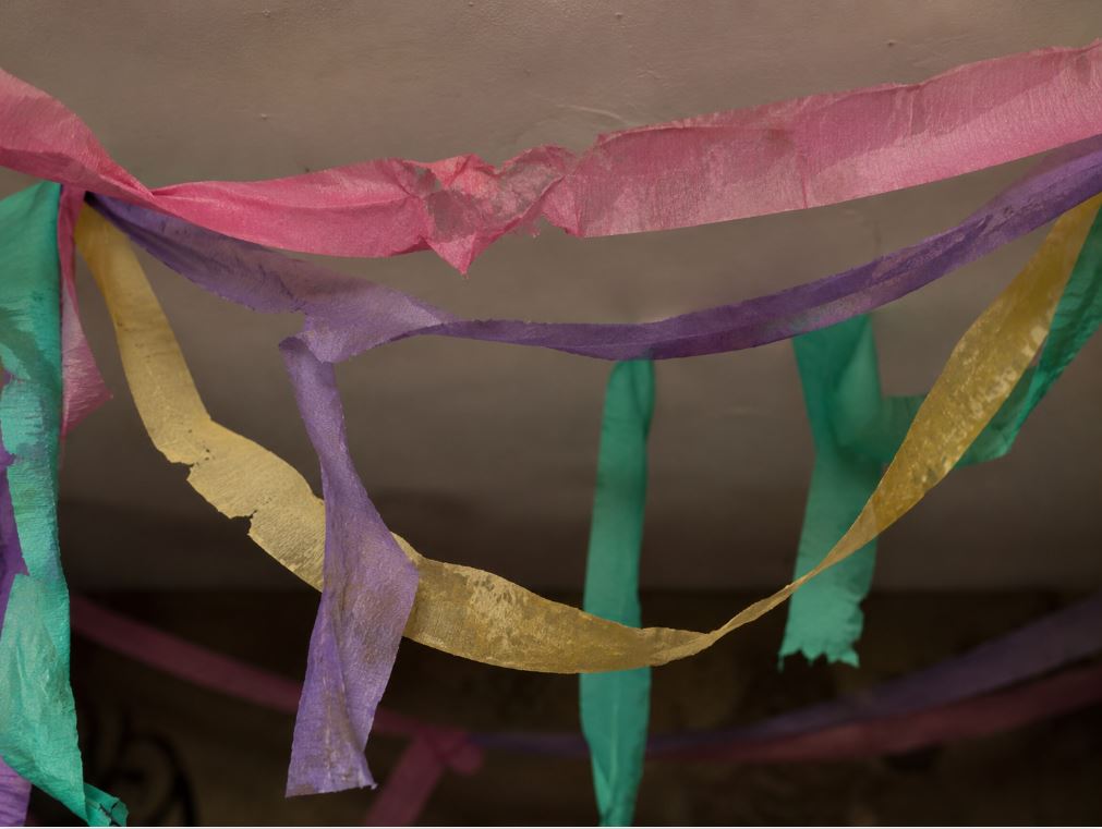 Cheap crepe paper streamers sagging and losing color at a party/decorish.pk